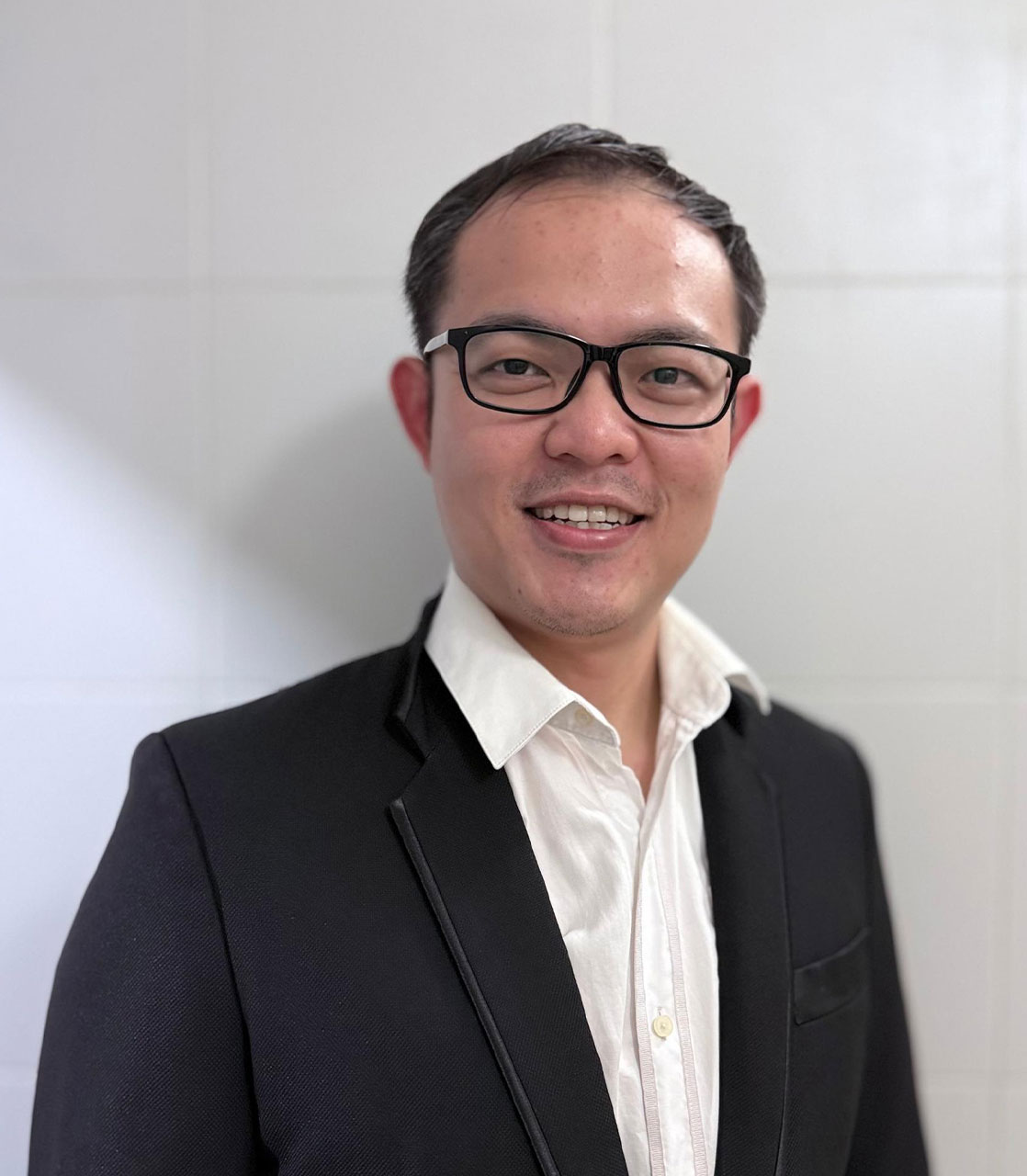 Dr. Yew Len Young